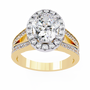 ring showcases a spectacular Oval Diamond encircled by a shimmering halo
