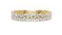 Gold bracelet with diamond accents on a white background