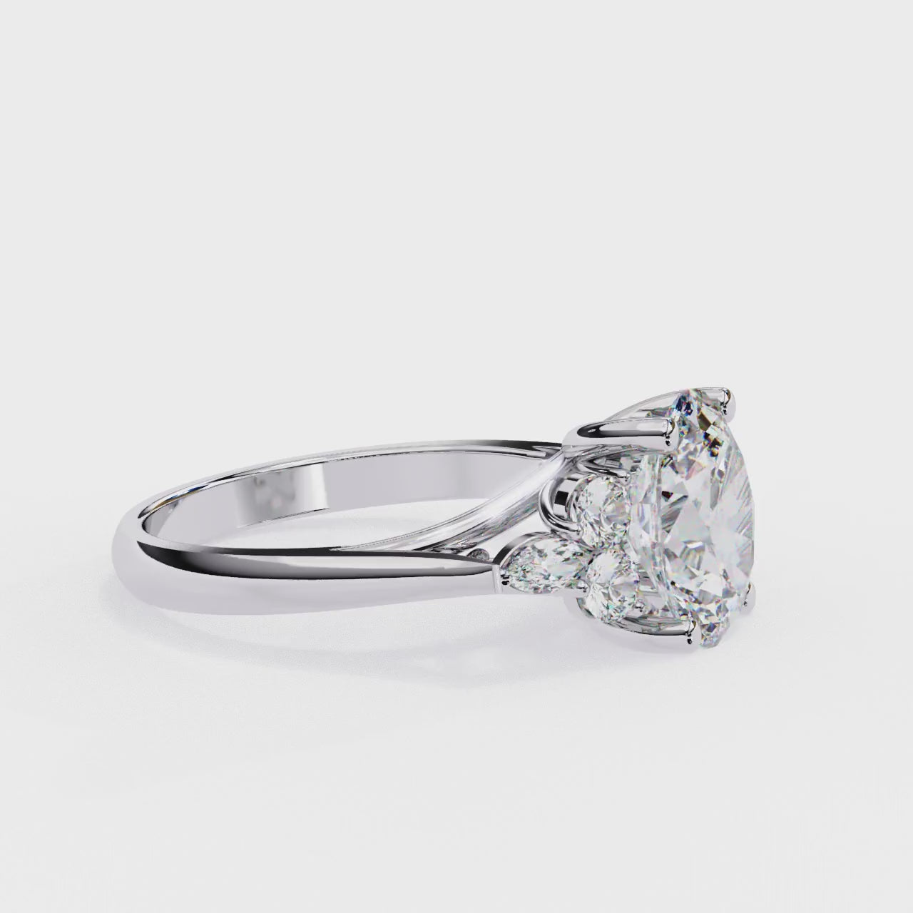ring showcases a commanding Oval centre flanked by an elite arrangement of Round and Marquise-cut diamonds