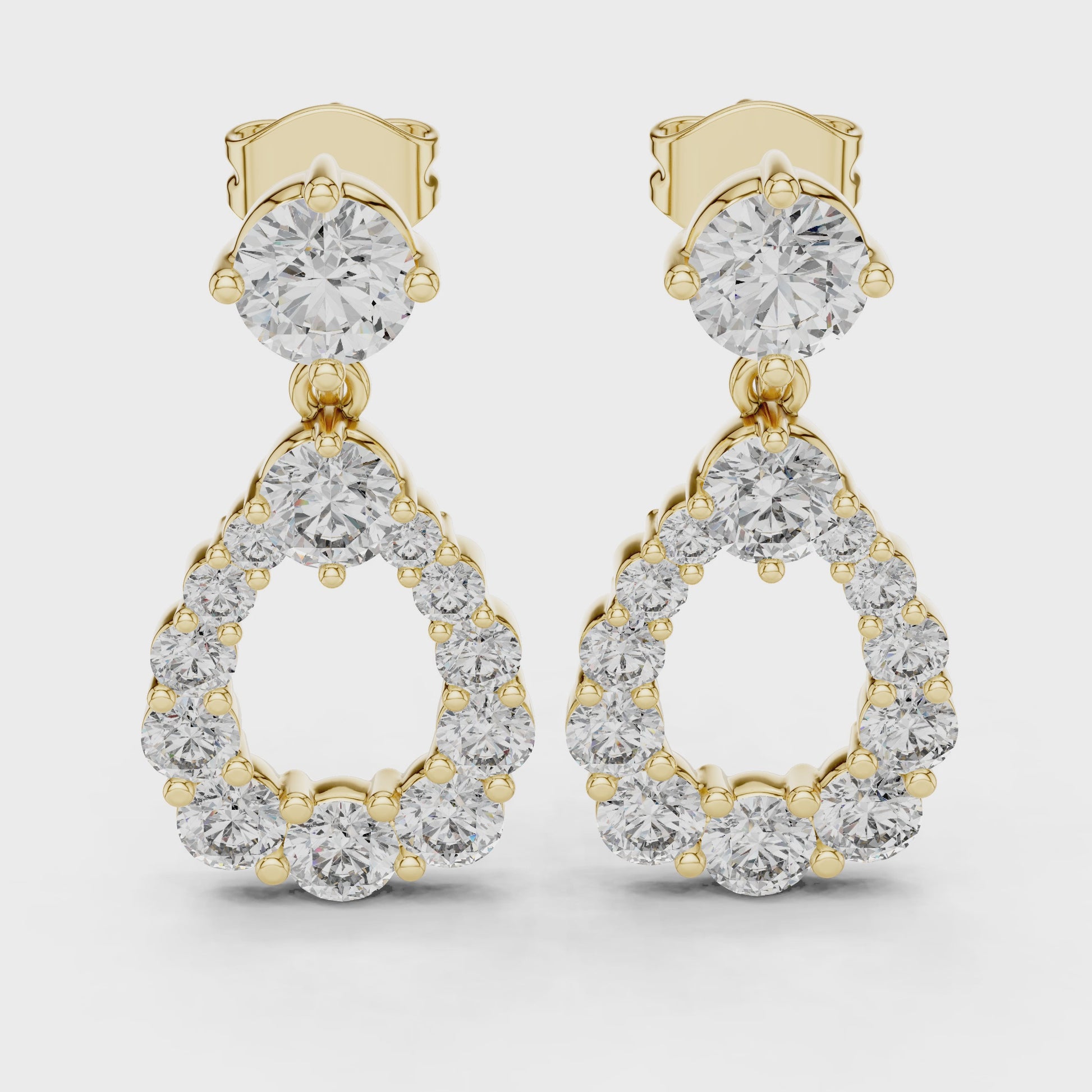 Brilliant round diamond and gold earrings