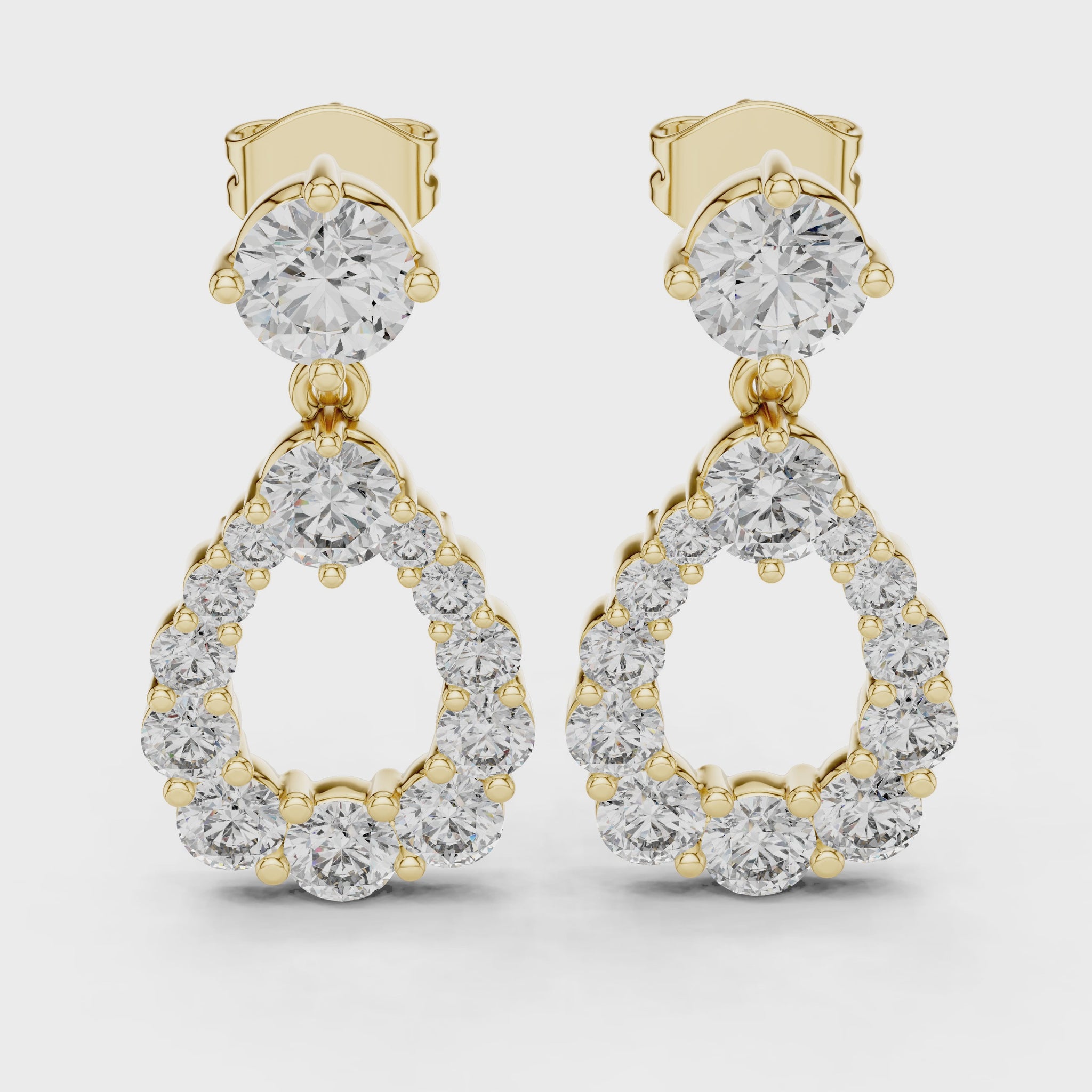Brilliant round diamond and gold earrings