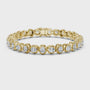 Gold bracelet with diamond accents on a white background