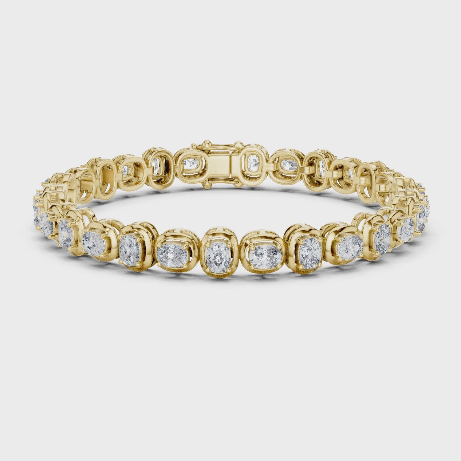 Gold bracelet with diamond accents on a white background
