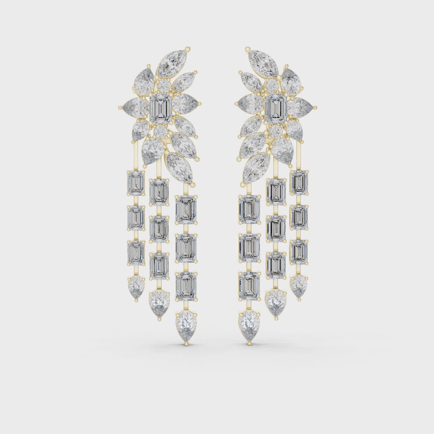 complex top cluster featuring a central Emerald Diamond framed by glistening Pear and Marquise cuts
