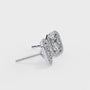 Pair of diamond earrings with white gold frames on a white background