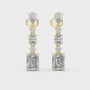 Gold and diamond earrings on a white background