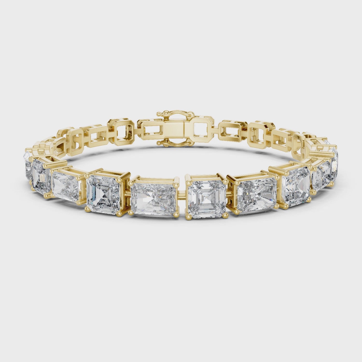 Gold bracelet with square-cut diamonds on a white background