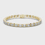 Gold bracelet with diamond accents on a white background