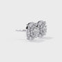 Pair of gold and diamond earrings on a white background