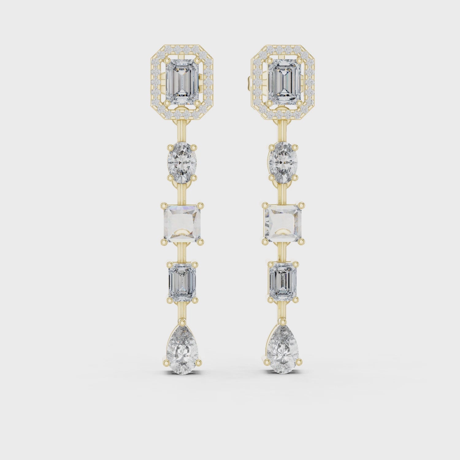 grand-multi-shape-drop-earrings-emerald-halo