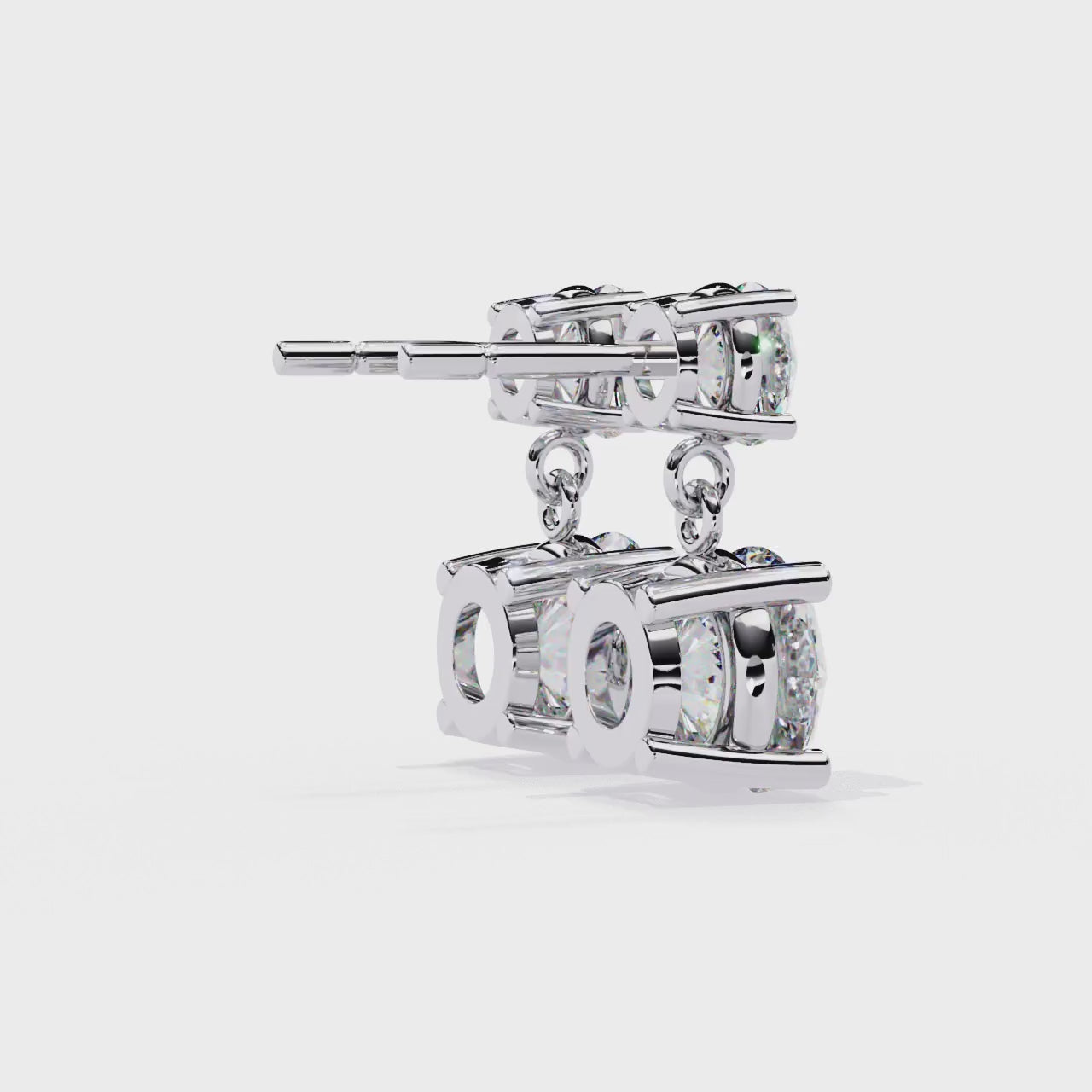 Pair of diamond earrings on a white background