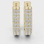 Gold hoop earrings with diamond accents on a white background