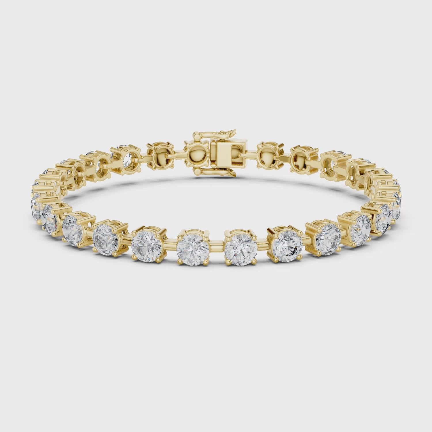 Gold bracelet with diamonds on a white background