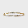 Gold bracelet with diamonds on a white background