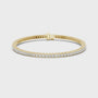 Gold bracelet with diamonds on a white background