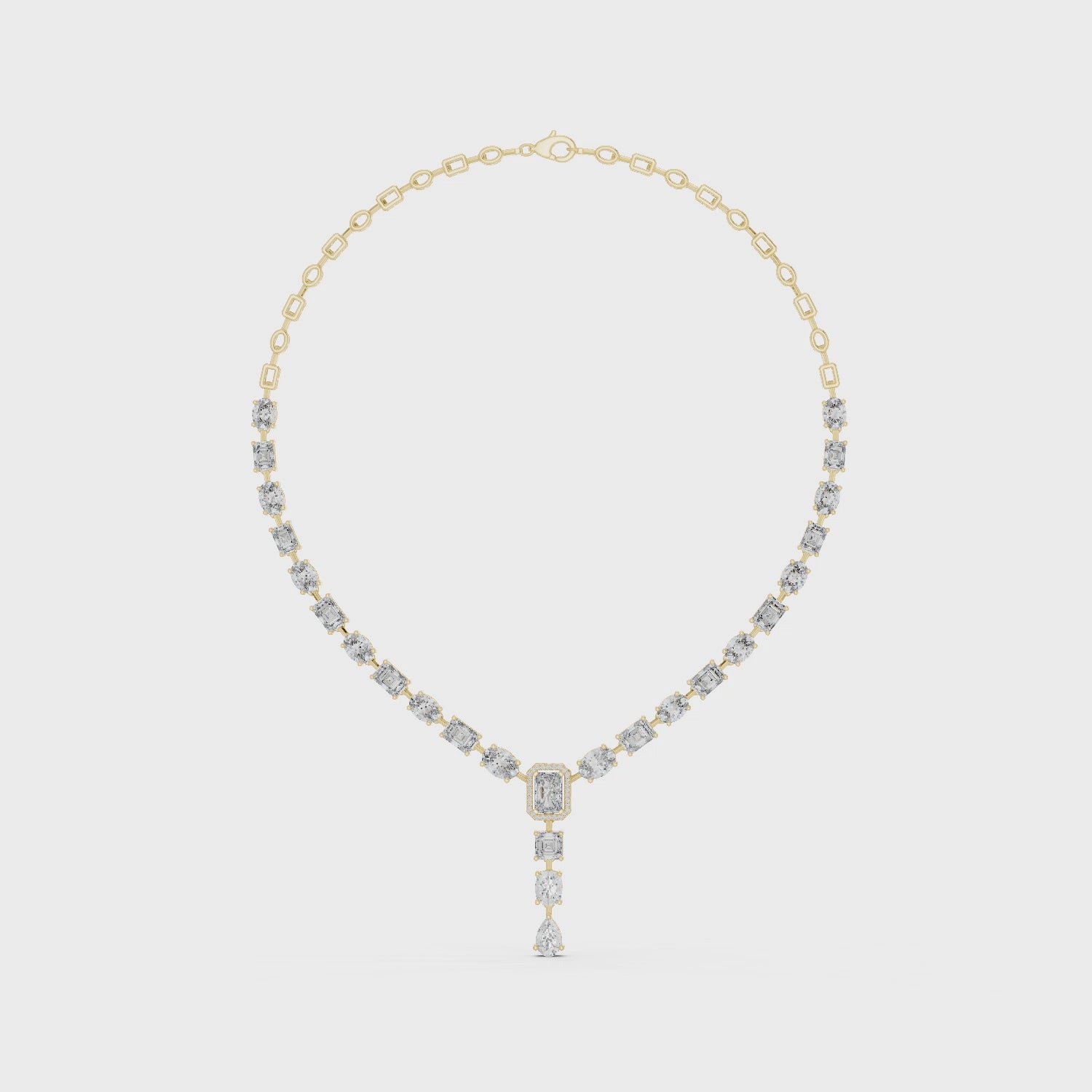 Gold necklace with diamond pendant on a white background