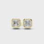 Gold square stud earrings on a white background