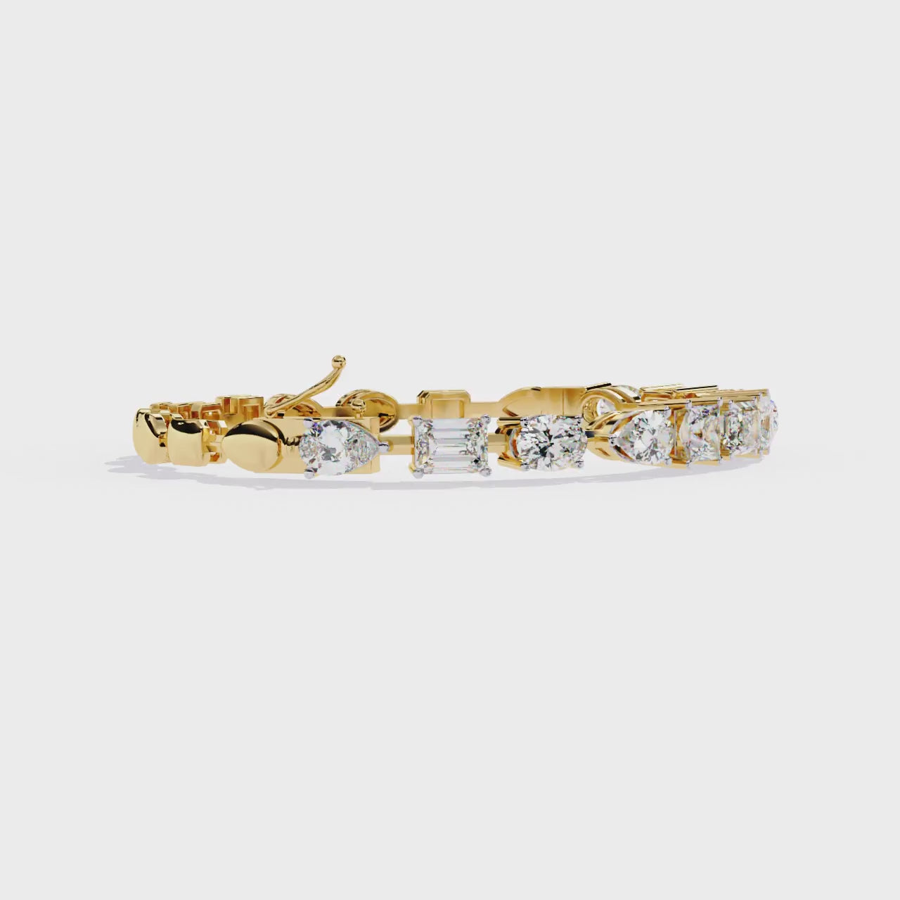 Gold and silver bracelet with diamonds on a white background