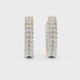 Pair of diamond hoop earrings on a white background