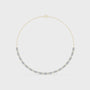 Gold necklace with diamonds on a white background