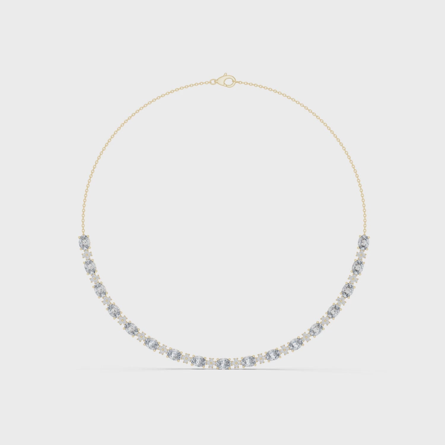 Gold necklace with diamonds on a white background