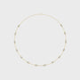Gold necklace with small diamonds on a white background