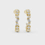 Gold earrings with diamonds on a white background