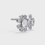 Pair of snowflake-shaped diamond earrings on a white background