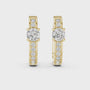 Gold earrings with diamond accents on a white background