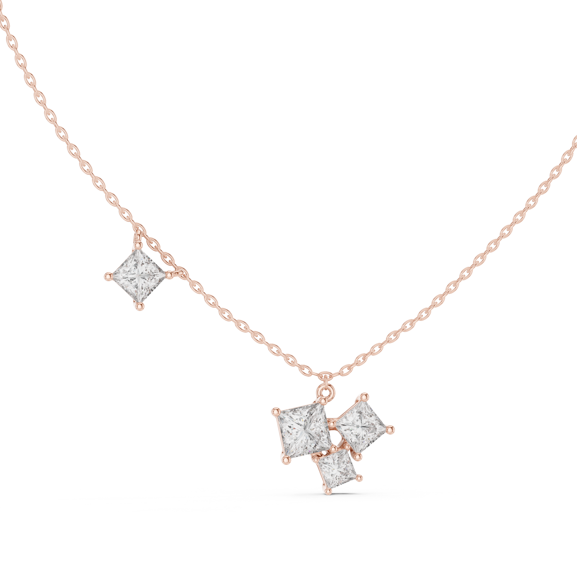 This pendant features a dynamic cluster of three Princess-cut diamonds meticulously arranged in an asymmetrical composition