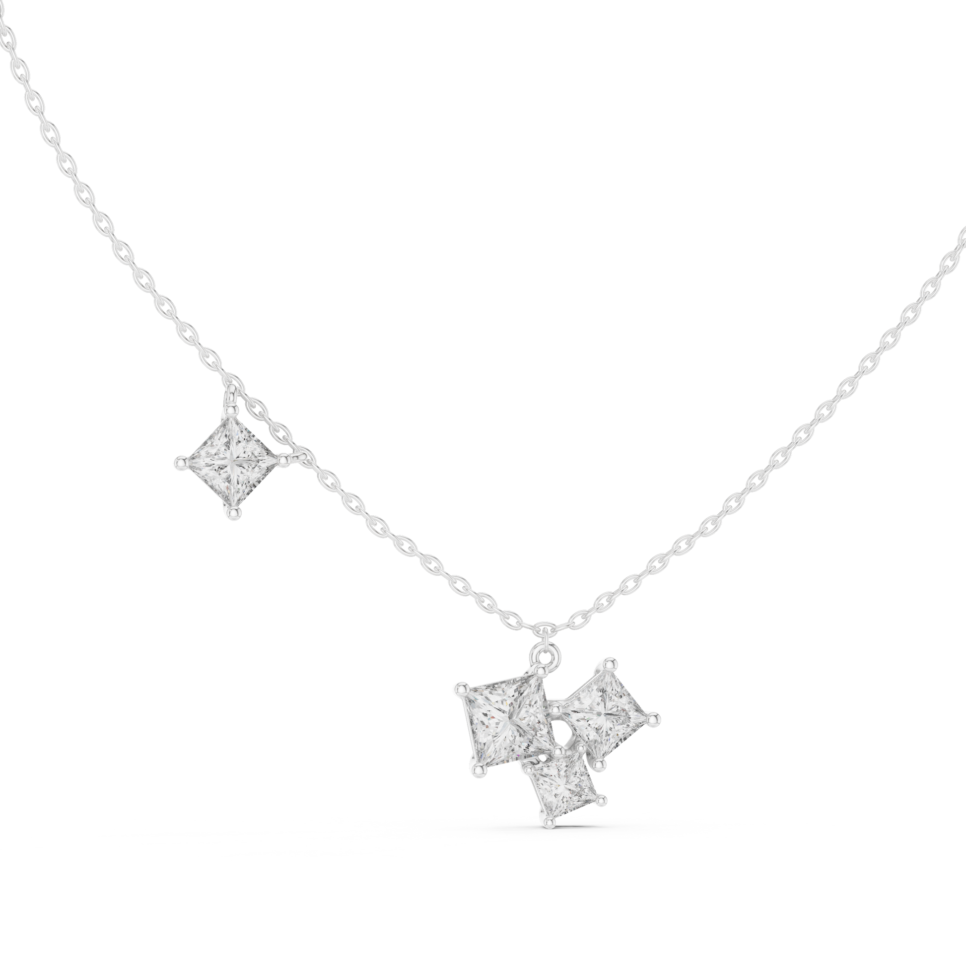 This pendant features a dynamic cluster of three Princess-cut diamonds meticulously arranged in an asymmetrical composition