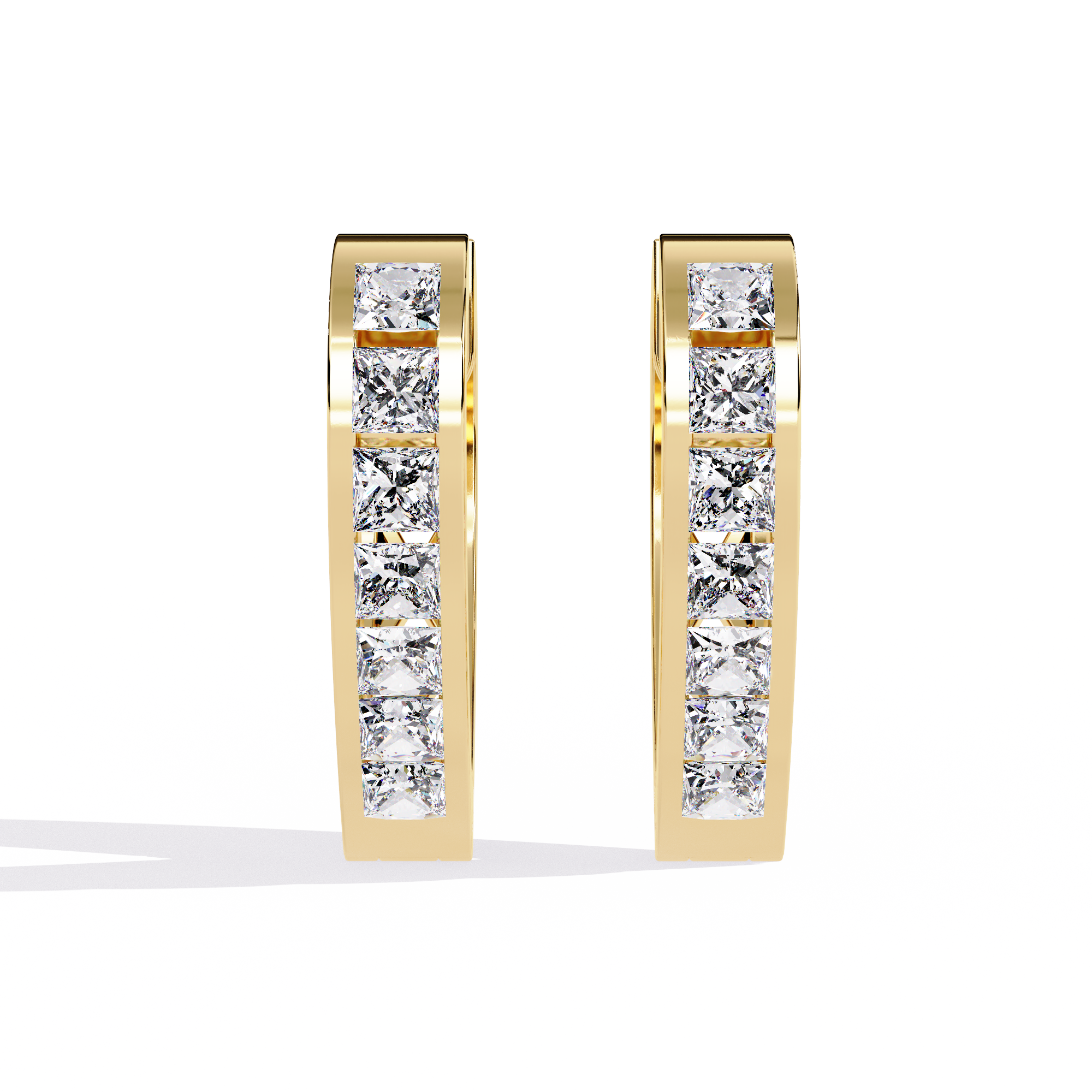 Gold hoop earrings with embedded diamonds on a white background