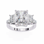 ring features a substantial Radiant-cut solitaire flanked by matching Radiant and Baguette-cut side stones