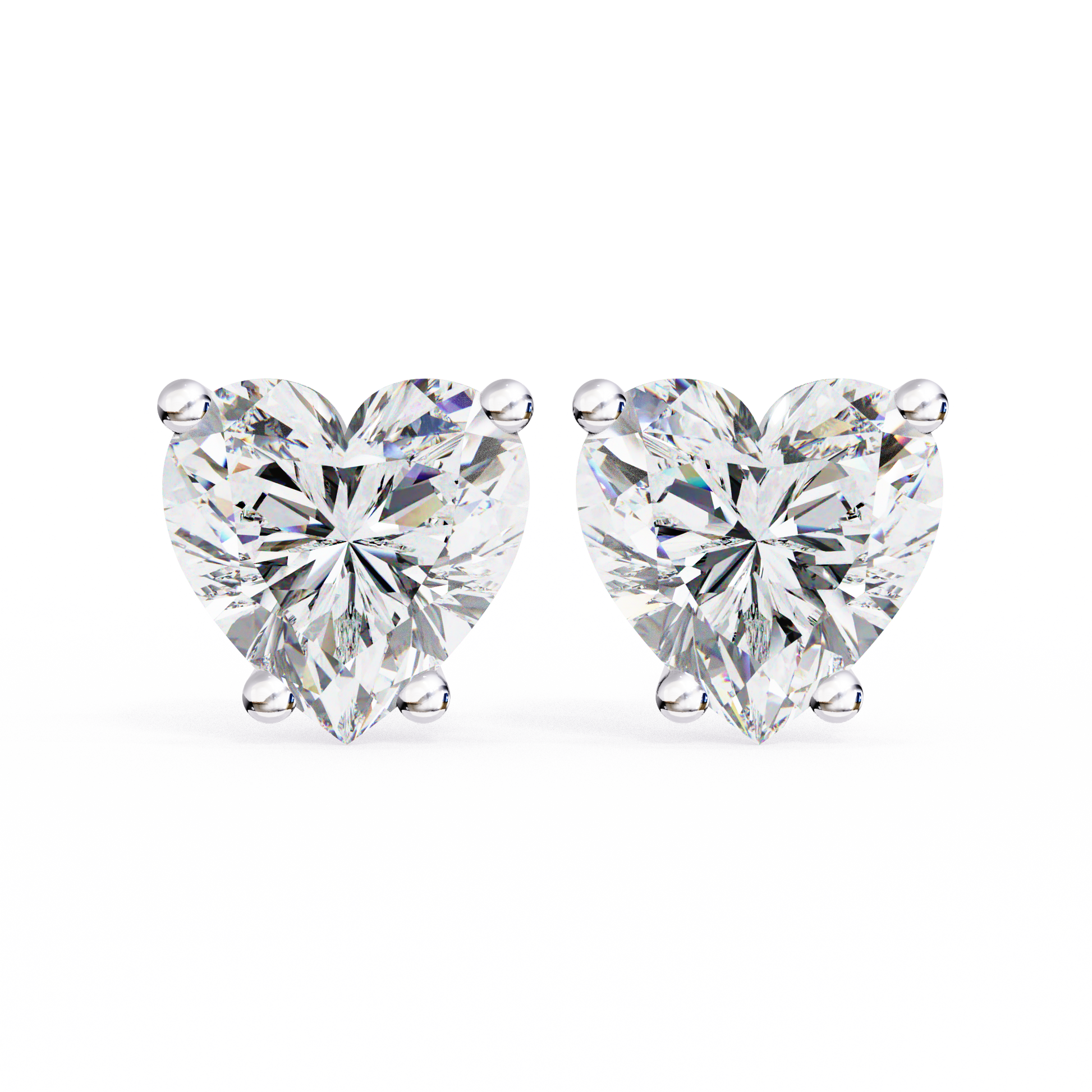 Heart-shaped diamond earrings on a white background