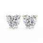 Heart-shaped diamond earrings on a white background