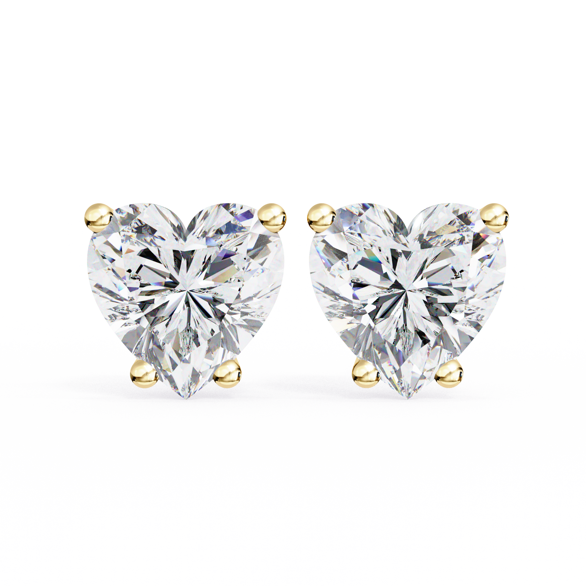 Heart-shaped diamond earrings on a white background