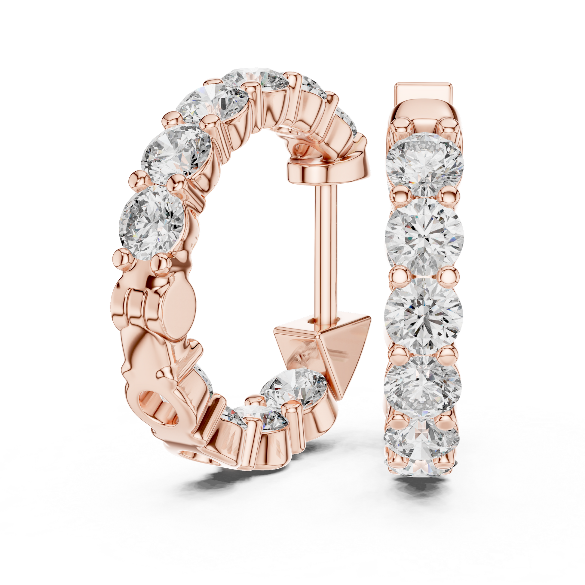 Rose gold hoop earrings with diamonds on a white background