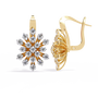 Gold and diamond snowflake earrings on a white background