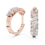 Rose gold hoop earrings with diamond accents on a white background