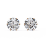 Pair of diamond stud earrings on a white background