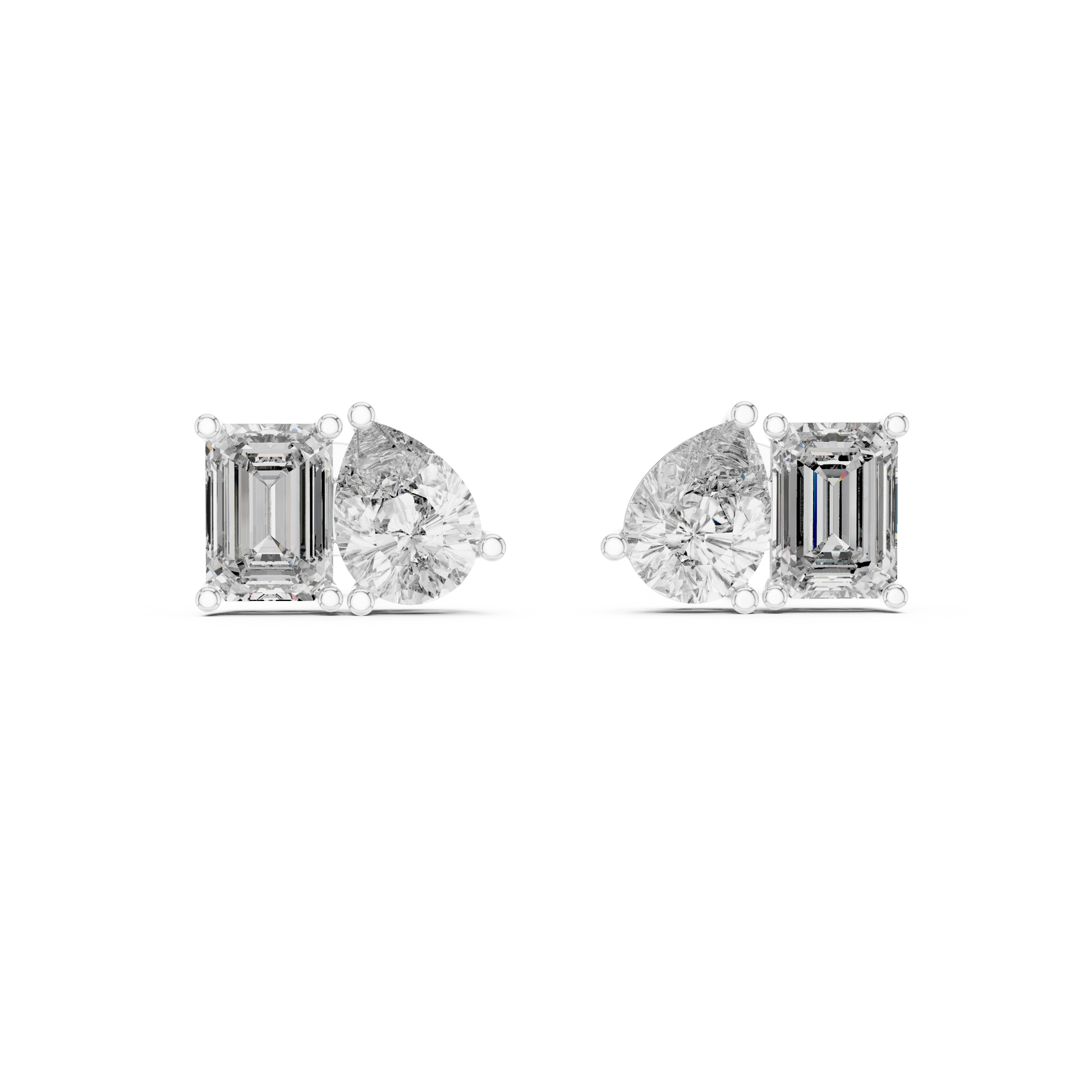 Diamond earrings with emerald-cut and pear-shaped stones on a white background