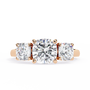 Cushion-cut solitaire flanked by two perfectly matched cushion-cut side stones