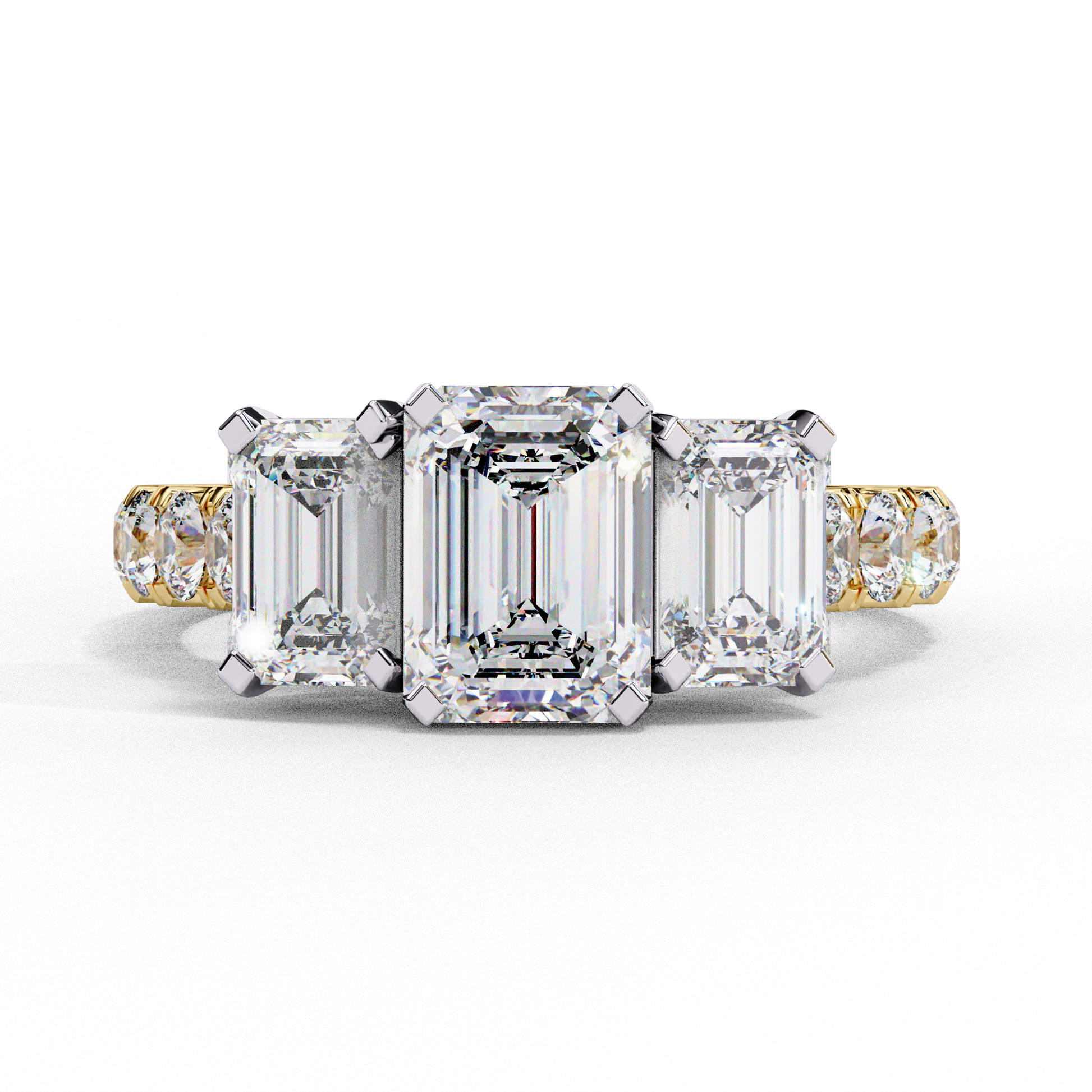 ring showcases a substantial Emerald-cut solitaire flanked by two perfectly matched emerald-cut side stones