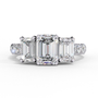 ring showcases a substantial Emerald-cut solitaire flanked by two perfectly matched emerald-cut side stones
