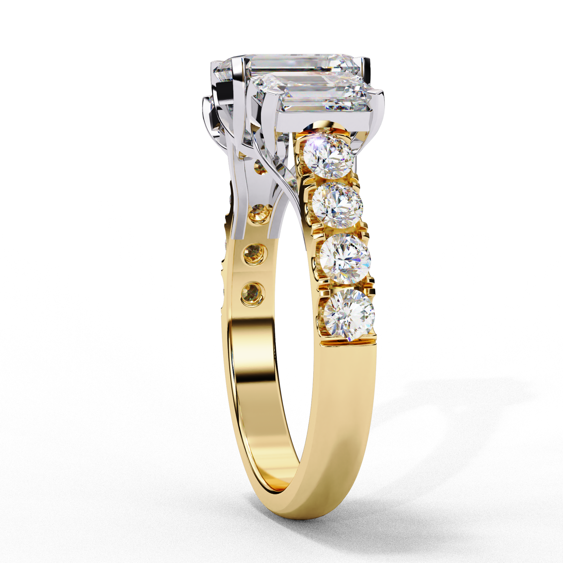 ring showcases a substantial Emerald-cut solitaire flanked by two perfectly matched emerald-cut side stones