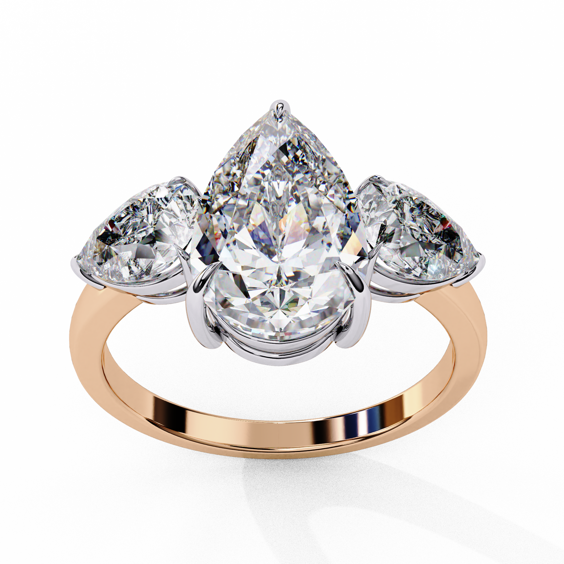 trilogy ring showcases a substantial Pear centre flanked by two perfectly matched pear-shaped side stones