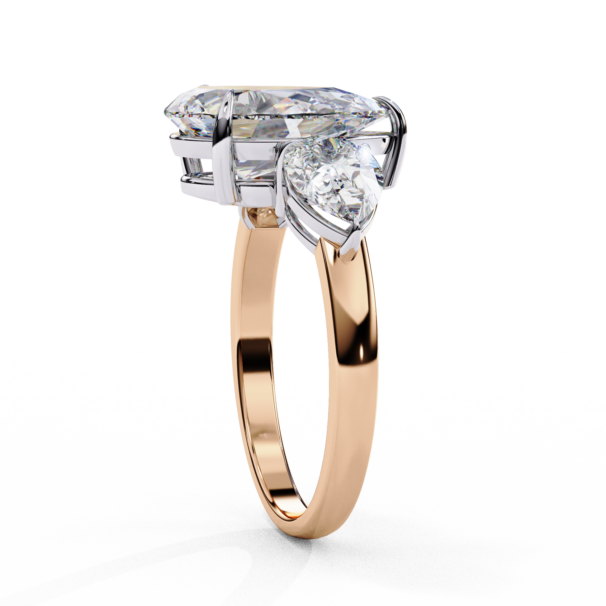 trilogy ring showcases a substantial Pear centre flanked by two perfectly matched pear-shaped side stones