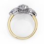 trilogy ring showcases a substantial Pear centre flanked by two perfectly matched pear-shaped side stones