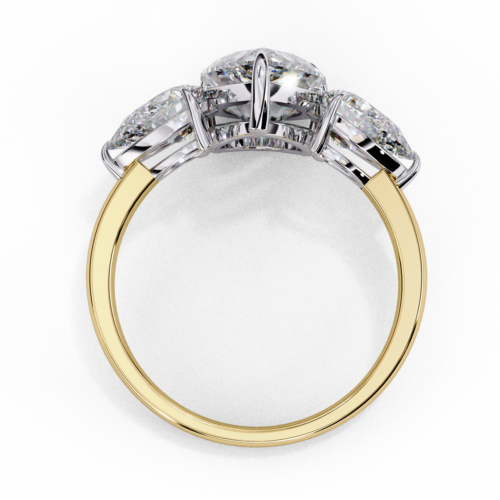 trilogy ring showcases a substantial Pear centre flanked by two perfectly matched pear-shaped side stones