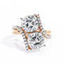 ring features two massive Cushion-cut diamonds set in a dramatic vertical orientation